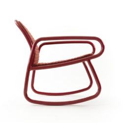 a red minimalistic rocking chair